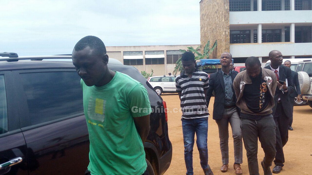 The three accused persons being escorted out of the court premises The three accused persons being escorted out of the court premises